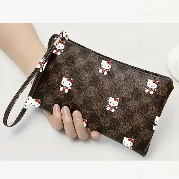Sanrio Handbags - Sanrio Brown Checkered Hello Kitty Wristlet